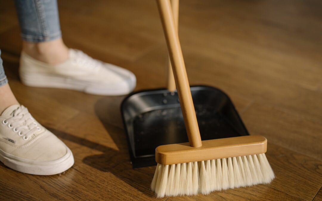 Cleaning up with a broom and dust pan is like completing a refresh of blog content annually. Here's why.